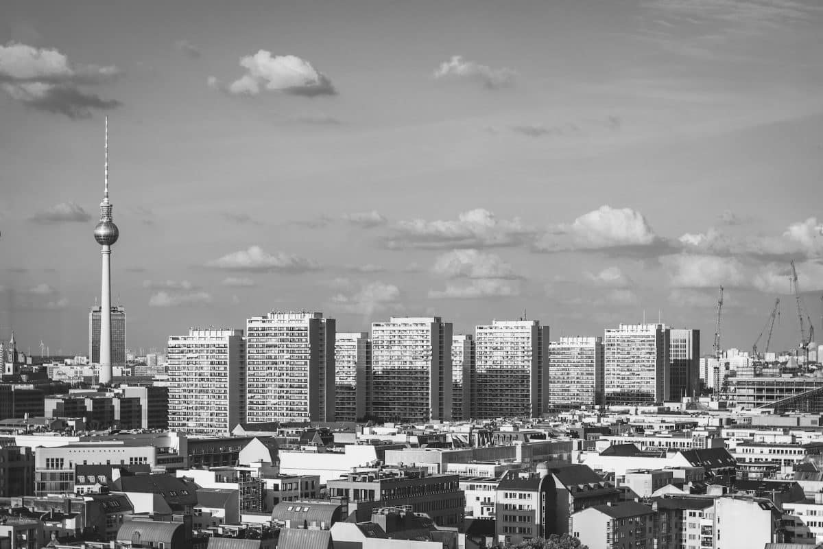 grayscale photo of high-rise buildings